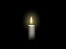candle burning with a black background
